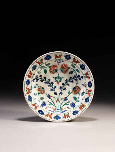 View full screen - View 1 of Lot 110. An Iznik polychrome pottery dish, Turkey, circa 1560-80.