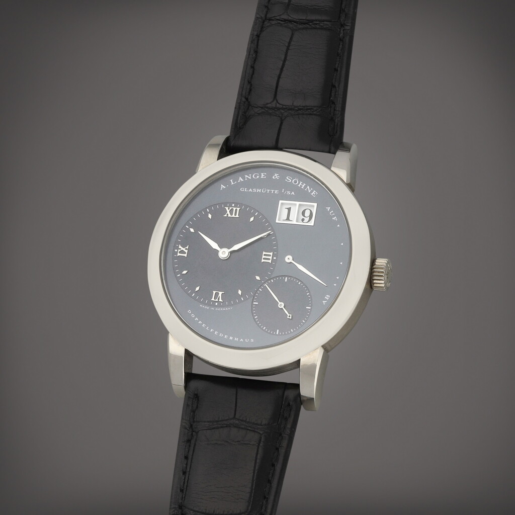 View full screen - View 1 of Lot 27. Lange 1, Reference 101.027 | A white gold wristwatch with digital date display and power reserve indication | Circa 2001.
