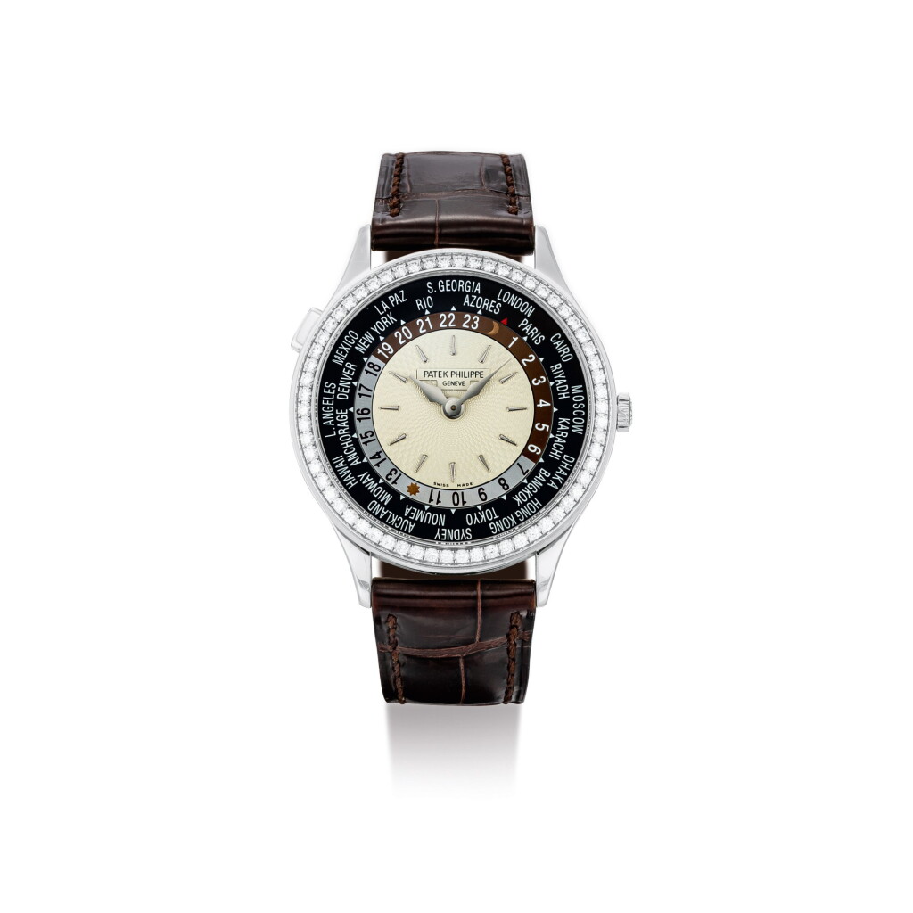 View full screen - View 1 of Lot 2059. PATEK PHILIPPE | REFERENCE 7130, A WHITE GOLD AND DIAMOND-SET WORLD TIME WRISTWATCH, CIRCA 2018 | 百達翡麗 | "型號7130 白金鑲鑽石世界時間腕錶,機芯編號5733044,錶殼編號4631394,約2018年製".