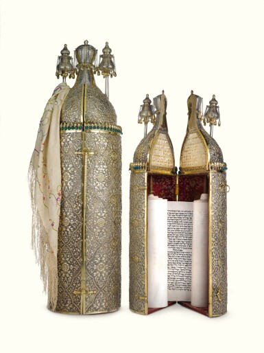 View full screen - View 1 of Lot 38. A RARE SET OF CHINESE EXPORT PARCEL-GILT SILVER-CASED TORAH SCROLL AND HAFTARAH SCROLL, THE SCROLLS SENT BY THE BEN ISH HAI TO FLORA SASSOON, THE CASES MARKED GOTHIC K, PROBABLY 1893.