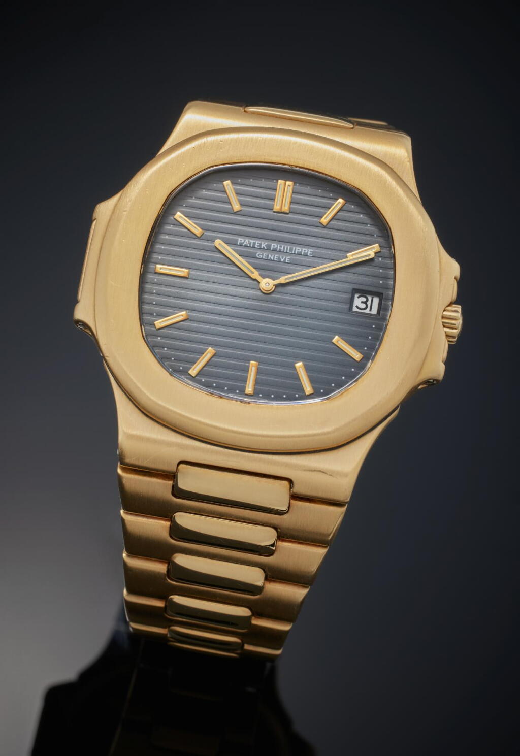 View full screen - View 1 of Lot 57. Reference 3700/1 Nautilus 'Jumbo' | A yellow gold automatic wristwatch with date and bracelet, Made in 1979.