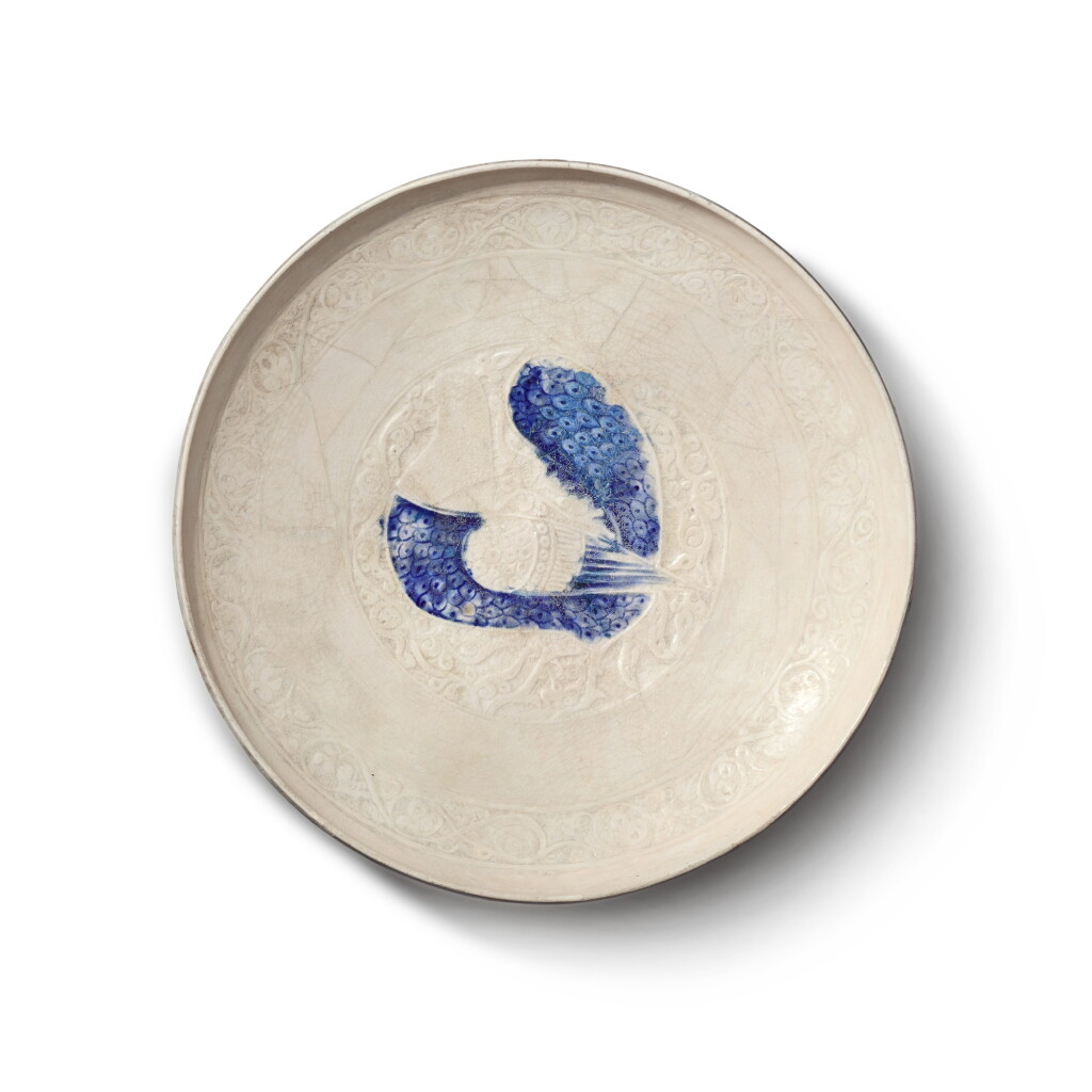 View full screen - View 1 of Lot 105. A large dish with a peacock, Persia, probably Kashan, late 12th century.