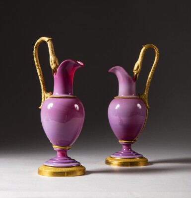 View full screen - View 1 of Lot 459. A pair of Charles X gilt-bronze mounted opaline ewers, circa 1825 | Paire d’aiguières en opaline et monture de bronze doré d’époque Charles X .