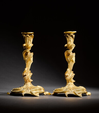 View full screen - View 1 of Lot 20. A pair of Louis XV gilt-bronze candlesticks, in the manner of Juste-Aurèle Meissonnier, circa 1740.