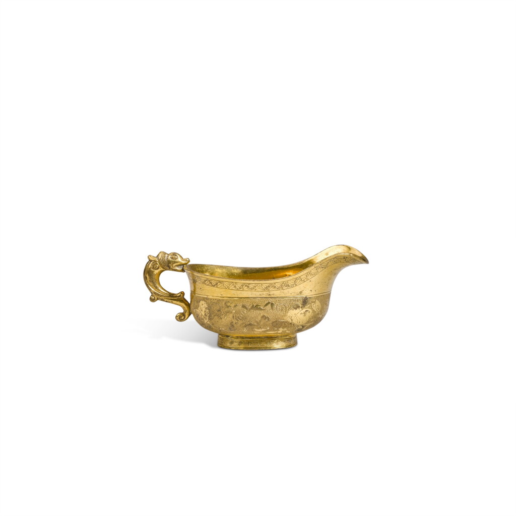 View full screen - View 1 of Lot 868. A small gilt-bronze pouring vessel (Yi), Qing dynasty.