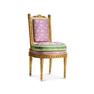 View full screen - View 1 of Lot 7. A Louis XVI gilt walnut chair, stamped by Georges Jacob, circa 1784-1785, for the boudoir of queen Marie-Antoinette at Versailles | Chaise royale en noyer sculpté et doré d’époque Louis XVI, estampille de Georges Jacob, vers 1784-1785, pour le boudoir de Marie-Antoinette au château de Versailles.