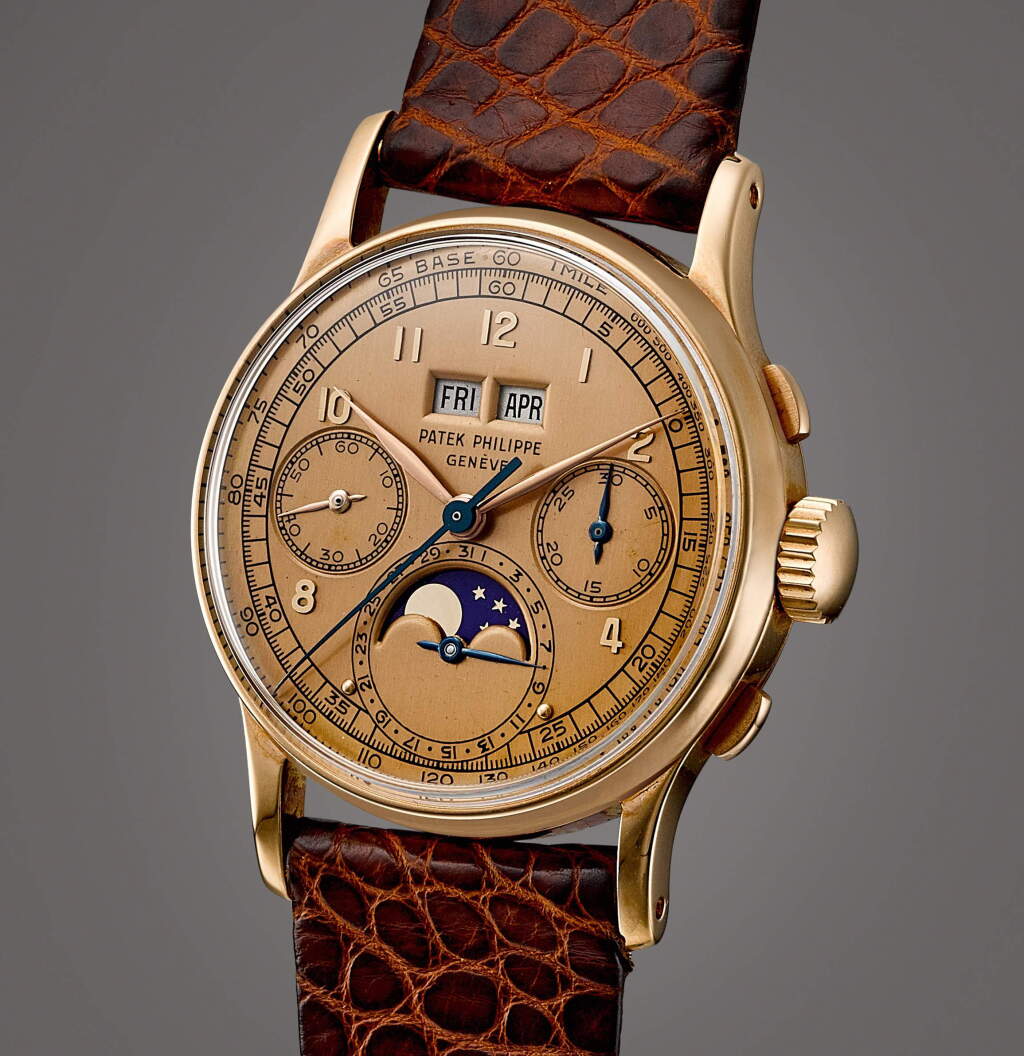 View full screen - View 1 of Lot 2009. Reference 1518 | A pink gold perpetual calendar chronograph wristwatch with moon phases and pink dial, Made in 1948 | 百達翡麗 | 型號1518 | 粉紅金萬年曆計時腕錶,備月相顯示及粉紅色錶盤,1948年製.