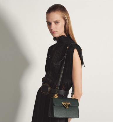 View full screen - View 1 of Lot 38. PRADA | SAFFIANO LEATHER SYMBOLE BAG WORN BY LEXI BOLING.
