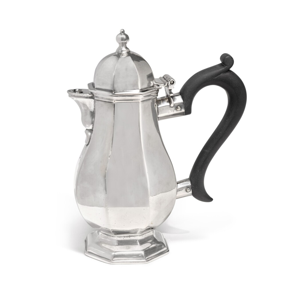 View full screen - View 1 of Lot 250. A Queen Anne silver Octagonal Hot Milk Pot, maker's mark -A, London, 1710.