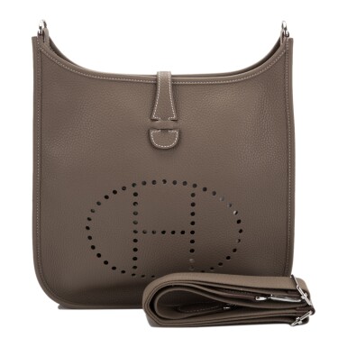 View full screen - View 1 of Lot 71. HERMÈS | ETOUPE EVELYNE PM OF CLEMENCE LEATHER WITH PALLADIUM HARDWARE.