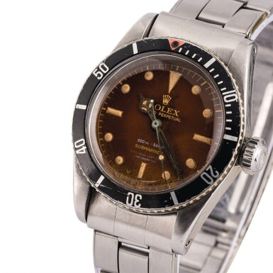 View full screen - View 1 of Lot 4. ROLEX | Submariner, Ref. 6538, A Stainless Steel Wristwatch with 4-Line “Tropical” Dial and Bracelet, Circa 1958.