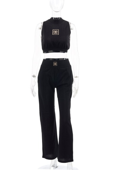 View full screen - View 1 of Lot 14. CHANEL | BLACK SPORT SUIT .