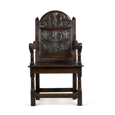 View full screen - View 1 of Lot 19. A Charles II carved oak panel back armchair, Lancashire/North Cheshire.