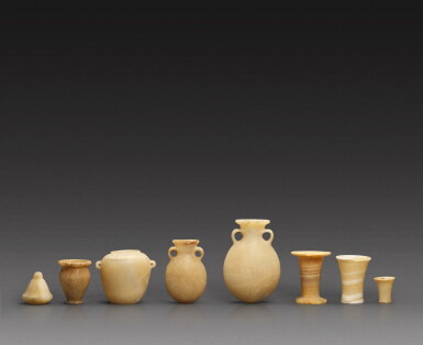 View full screen - View 1 of Lot 72. Eight Egyptian Alabaster Miniature Vessels, 3rd/2nd Millennium B.C..