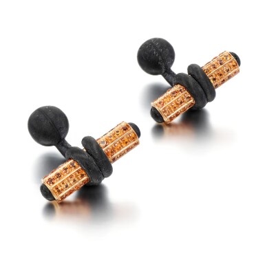 View full screen - View 1 of Lot 1029. Pair of pink gold, carbon fibre and orange sapphire cufflinks, 'Cappio' .