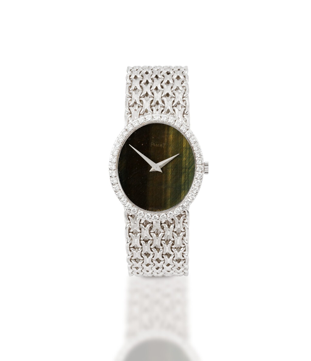 View full screen - View 1 of Lot 125. Piaget | Montre bracelet de dame or et diamants | Lady's gold and diamond bracelet watch.