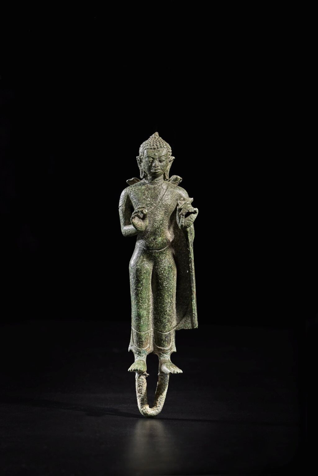 View full screen - View 1 of Lot 578. A bronze standing figure of Buddha, Sumatra or Central Java, circa 9th century.