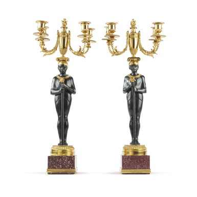 View full screen - View 1 of Lot 1. A pair of Italian gilt-bronze mounted black marble and Egyptian red porphyry five-light candelabra representing the god Ptah, late 18th century, probably Rome, in the manner of Valadier.