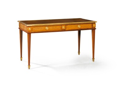 View full screen - View 1 of Lot 199. A PARTLY LOUIS XVI AMARANTH, TULIPWOOD, TINTED HORNBEAM AND GILT-BRONZE BUREAU PLAT, IN THE MANNER OF PHILIPPE MONTIGNY | BUREAU PLAT EN PLACAGE DE BOIS DE ROSE, AMARANTE, CHARME TEINTÉ ET MONTURE DE BRONZE REDORÉ EN PARTIE D'ÉPOQUE LOUIS XVI, DANS LE GOÛT DE PHILIPPE MONTIGNY.