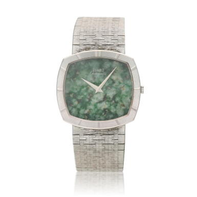 View full screen - View 1 of Lot 233. Reference 12425 A 6, A white gold automatic cushion shaped bracelet watch with jade dial, Circa 1965.