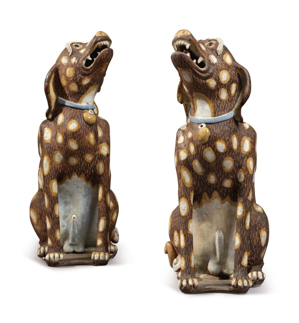 View full screen - View 1 of Lot 469. A Large and Unusual Pair of Chinese Export Stoneware Figures of Hounds, 19th / 20th Century | 十九 / 二十世紀 褐地白斑坐犬擺件一對.