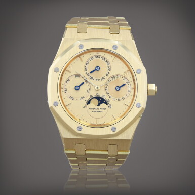 View full screen - View 1 of Lot 424. Royal Oak 'N.014', reference 25554BA Montre bracelet à quantième perpétuel en or jaune avec phases de lune | Yellow gold perpetual calendar wristwatch with moon phases and bracelet Vers 1985 | Circa 1985.