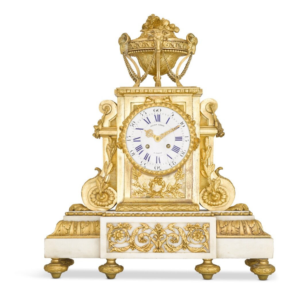 View full screen - View 1 of Lot 220. A Louis XVI-style gilt-bronze and white marble mantel clock, circa 1840.