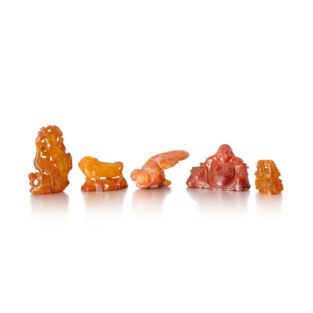 View full screen - View 1 of Lot 104. A group of three amber carvings, Qing dynasty, 19th century .