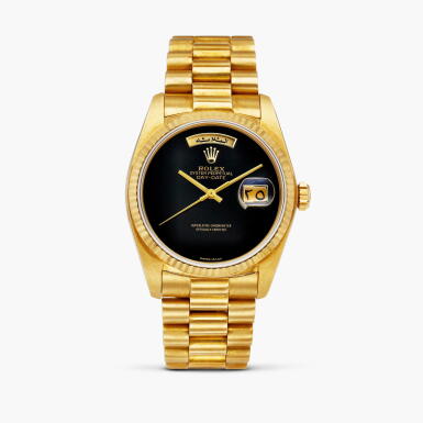 View full screen - View 1 of Lot 2552. Day-Date, Reference 18038 | A yellow gold wristwatch with Arabic day, date, onyx dial and bracelet, Circa 1982.