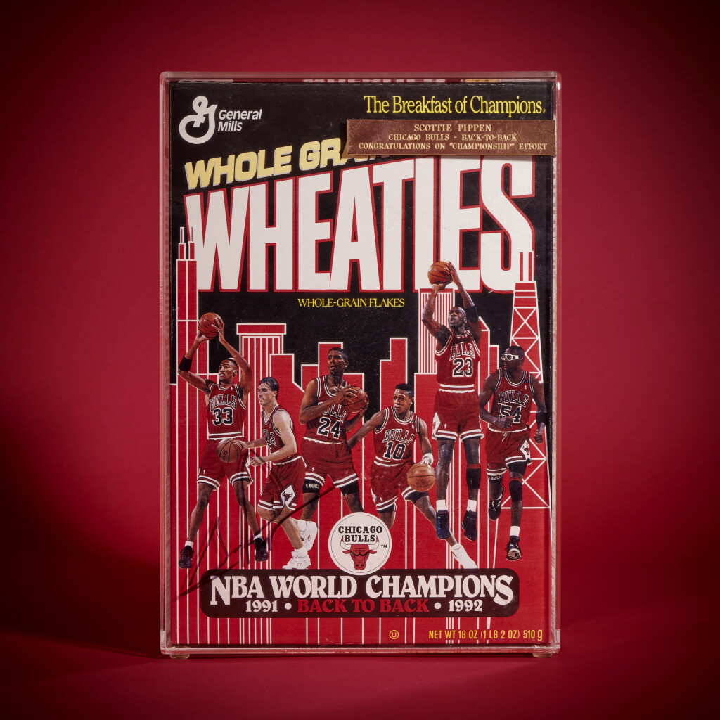 View full screen - View 1 of Lot 24. 1992 Chicago Bulls NBA World Champions Wheaties Box | Signed by Scottie Pippen.