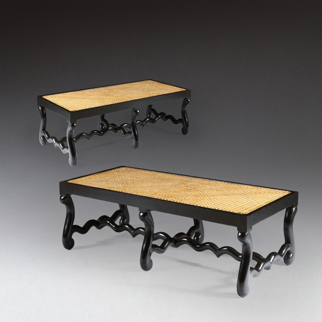 View full screen - View 1 of Lot 155. A pair of Louis XIII-style ebonised teak os de mouton caned benches, circa 2000 | Paire de banquettes cannées en teck noirci, dans le goût Louis XIII, vers 2000.