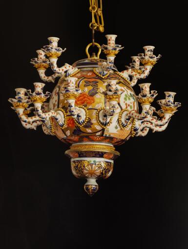View full screen - View 1 of Lot 186. A European gilt-bronze and polychrome porcelain eighteen-light chandelier, circa 1845.