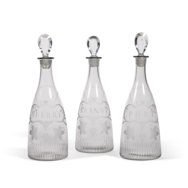 View full screen - View 1 of Lot 57. THREE GEORGE III ENGRAVED GLASS DECANTERS AND STOPPERS, CIRCA 1780.