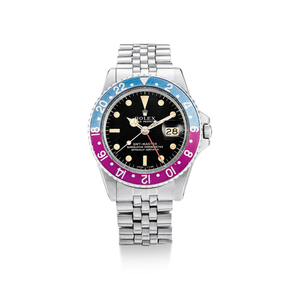 View full screen - View 1 of Lot 2125. ROLEX | GMT-MASTER, REFERENCE 1675, A STAINLESS STEEL DUAL TIME ZONE WRISTWATCH WITH DATE AND BRACELET, CIRCA 1966 | 勞力士 | "GMT-Master 型號1675 精鋼兩地時間腕錶,備日期顯示,錶殼編號1427842,約1966年製".