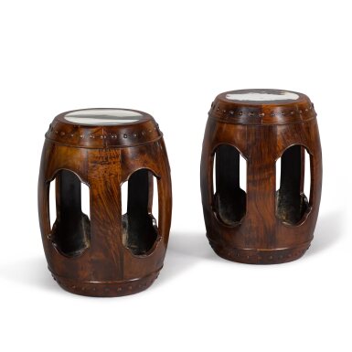 View full screen - View 1 of Lot 196. A pair of marble-inset hongmu garden stools, Late Ming dynasty | 明末 紅木嵌大理石面坐墩一對.