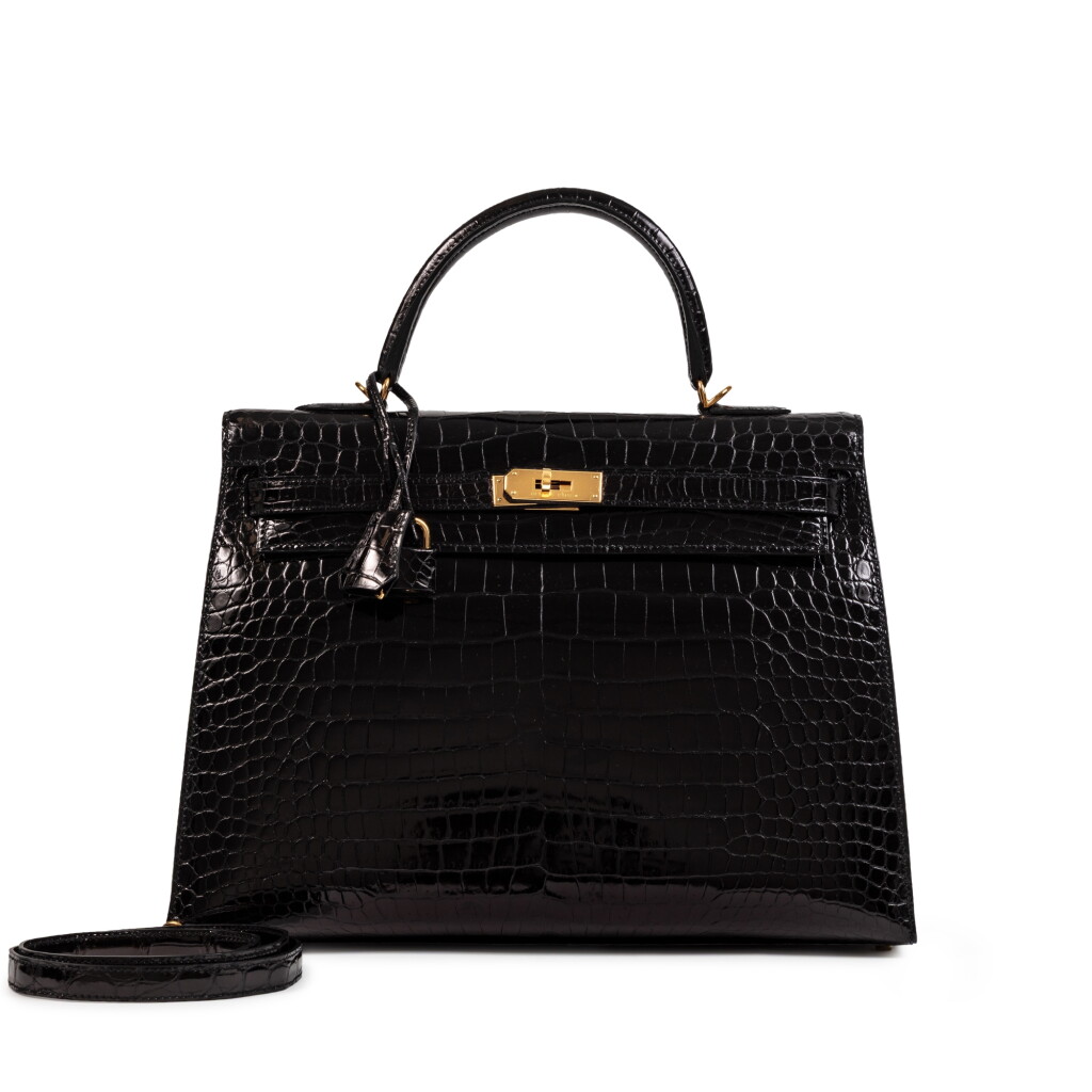 View full screen - View 1 of Lot 677. Black Shiny Porosus Crocodile Kelly 35 Sellier Gold Hardware, 2015.