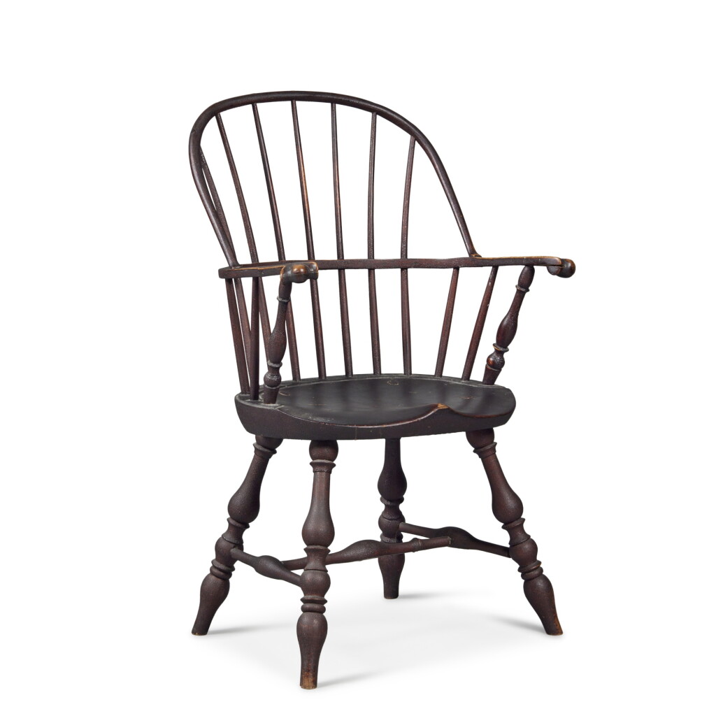 View full screen - View 1 of Lot 288. An Exemplary Black-Painted Sack-Back Knuckled Windsor Armchair, Pennsylvania, circa 1775.