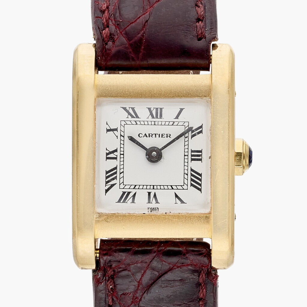 View full screen - View 1 of Lot 691. Reference 78093 Tank Normale | New York retailed: A yellow gold wristwatch with Paris dial, Circa 1970.