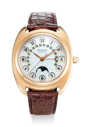 View full screen - View 1 of Lot 508. HERMES | DRESSAGE II, REFERENCE DR2.770.213 A LIMITED EDITION PINK GOLD WRISTWATCH WITH MOON PHASES, RETROGRADE DATE AND MOTHER-OF-PEARL DIAL, CIRCA 2005.