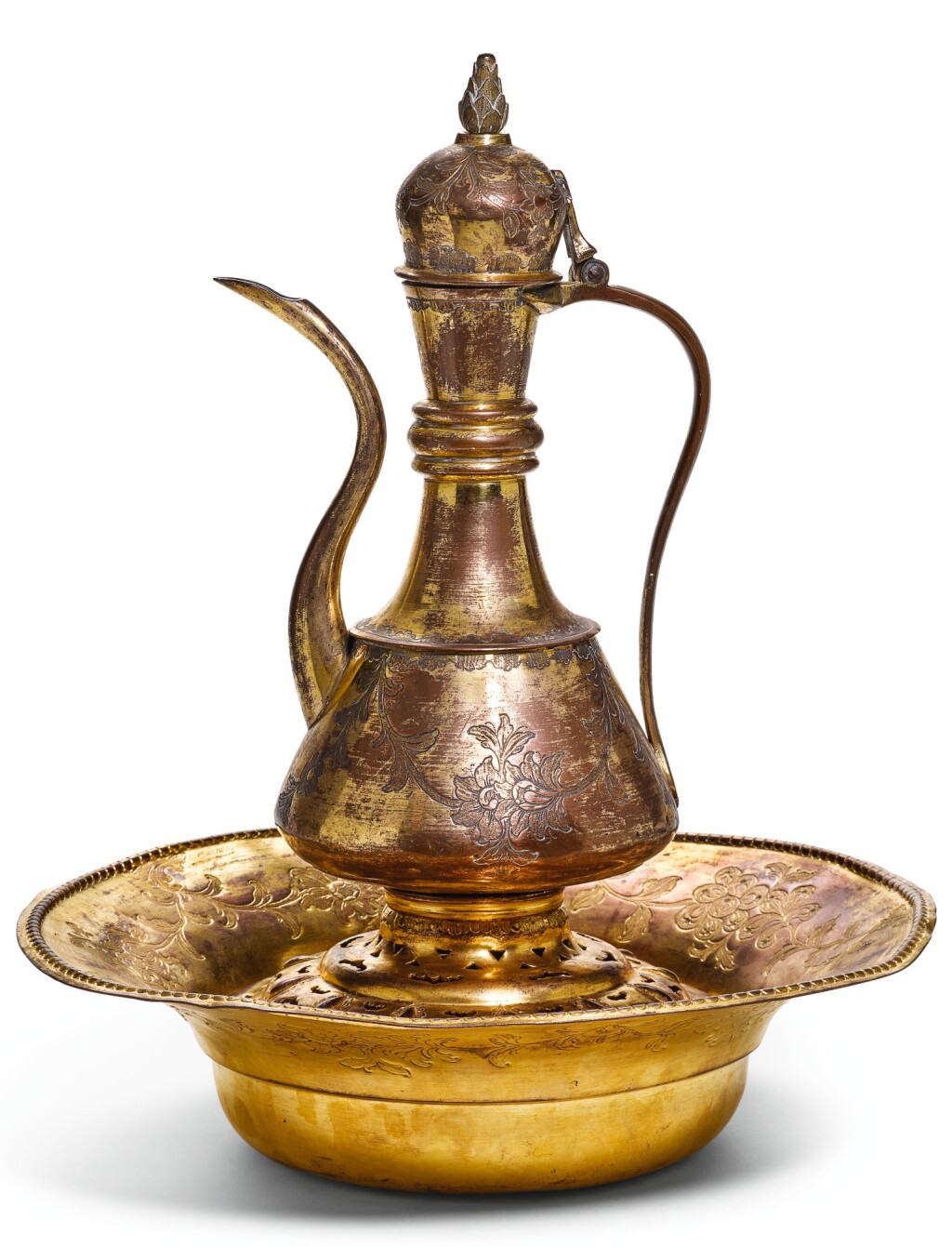 View full screen - View 1 of Lot 287. AN OTTOMAN GILT-COPPER (TOMBAK) LIDDED EWER, WITH ASSOCIATED BASIN AND FILTER, TURKEY, 18TH CENTURY .