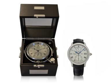 View full screen - View 1 of Lot 540. Marine Chronometer Set Limited Edition marine chronometer with power reserve indication and platinum wristwatch with digital date display, power reserve and day/night indication Circa 2010.