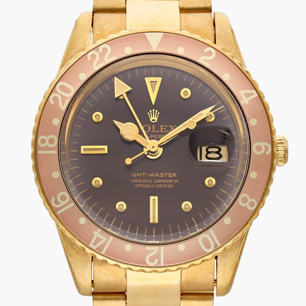 View full screen - View 1 of Lot 79. Reference 1675 GMT-Master 'Nipple Dial' | A yellow gold automatic dual time zone wristwatch with date and bracelet, Owned and screen worn by Peter Fonda in Easy Rider (1969), Circa 1966.
