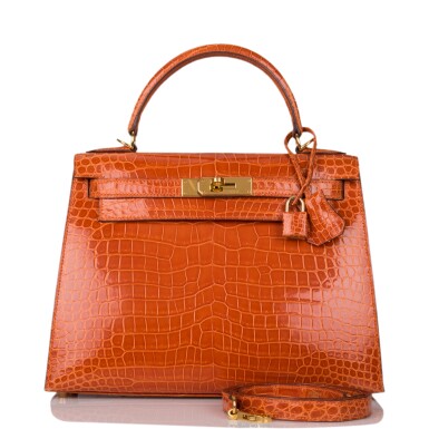 View full screen - View 1 of Lot 63. Hermès Pain d'Epice Shiny Sellier Kelly 28cm of Shiny Porosus Crocodile with Gold Hardware.