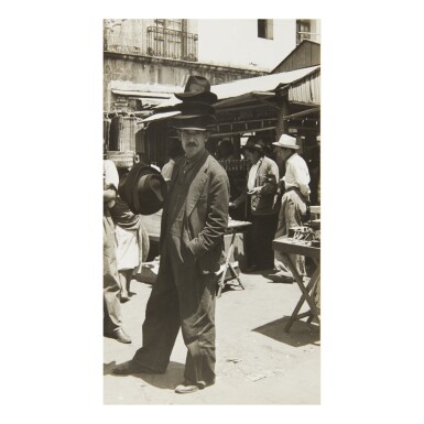 View full screen - View 1 of Lot 6. HELEN LEVITT | 'MEXICO' (HAT SELLER).