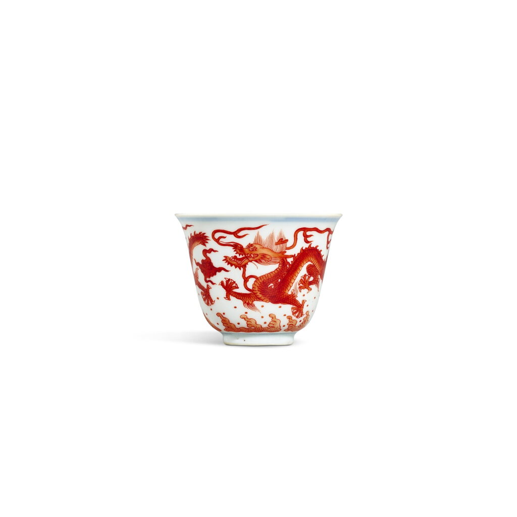 View full screen - View 1 of Lot 3355. A blue and white and iron-red 'dragon' cup, Seal mark and period of Qianlong | 清乾隆 青花礬紅龍紋小盃 《大清乾隆年製》款.