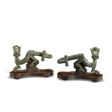 View full screen - View 1 of Lot 504. A pair of bronze 'dragon' bell hooks, Eastern Zhou dynasty, Spring and Autumn period 東周春秋 青銅龍形編鐘掛鉤一對.