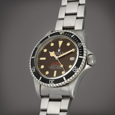 View full screen - View 1 of Lot 47. Sea-Dweller 'Tropical', Reference 1665 | A stainless steel wristwatch with date, helium escape valve, tropical dial and bracelet | Circa 1971.