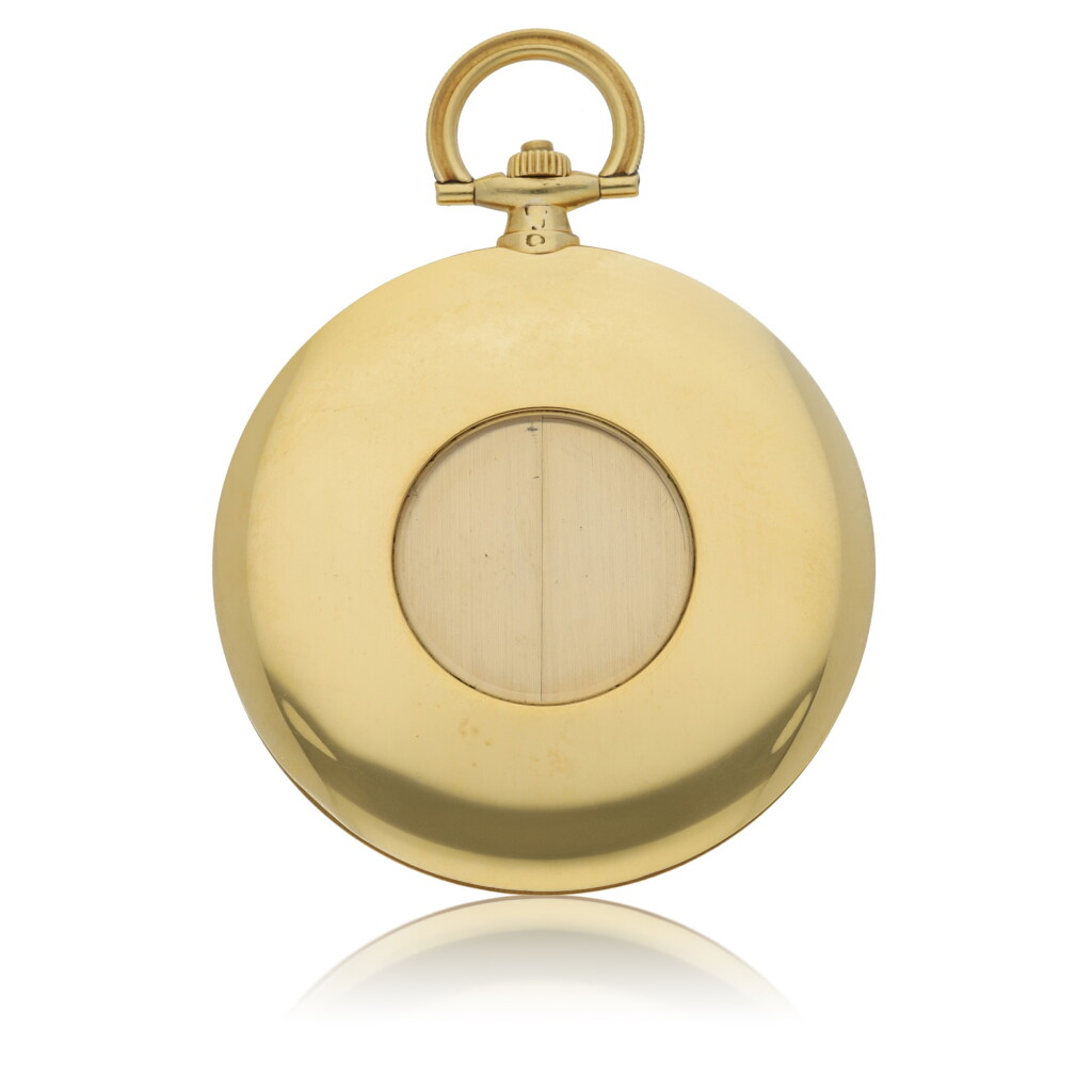 View full screen - View 1 of Lot 43. CARTIER, PARIS | A YELLOW GOLD WATCH WITH CONCEALED GUILLOTINE DIAL CIRCA 1930.