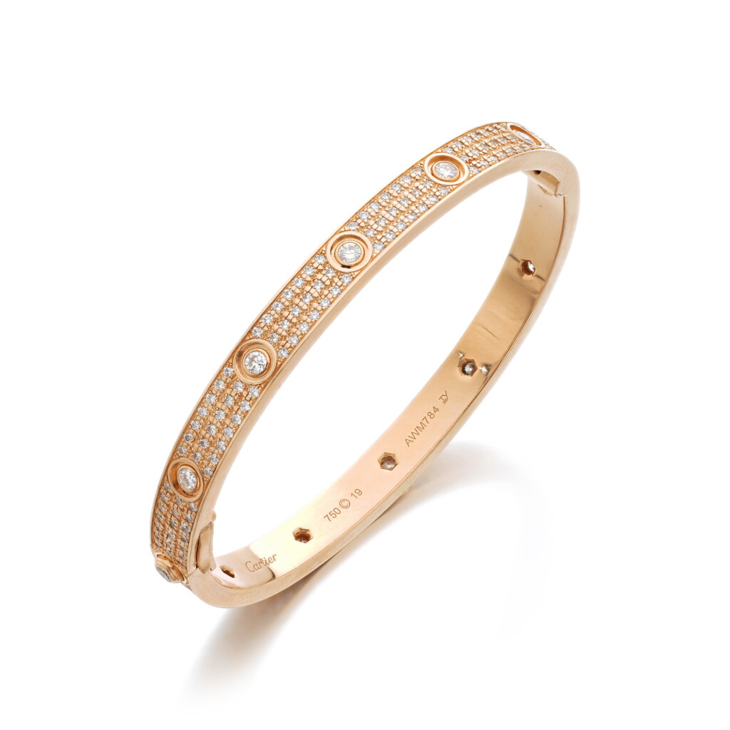 View full screen - View 1 of Lot 709. Gold and Diamond ‘Love’ Bangle.
