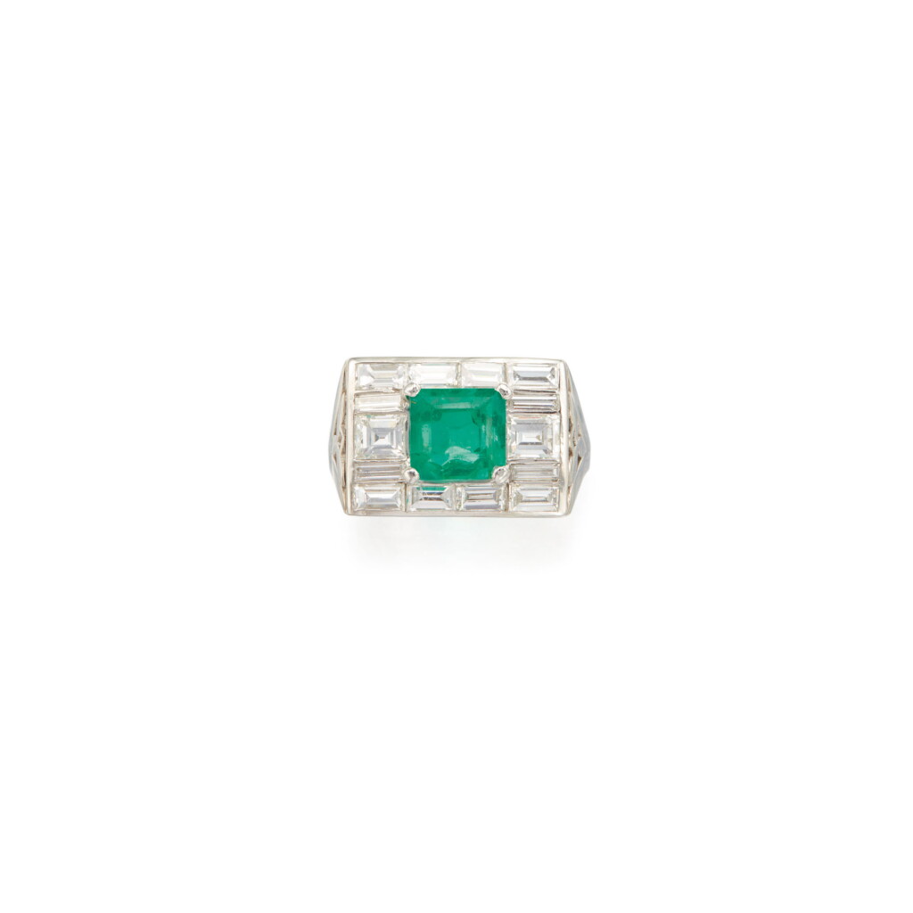 View full screen - View 1 of Lot 284. EMERALD AND DIAMOND RING.